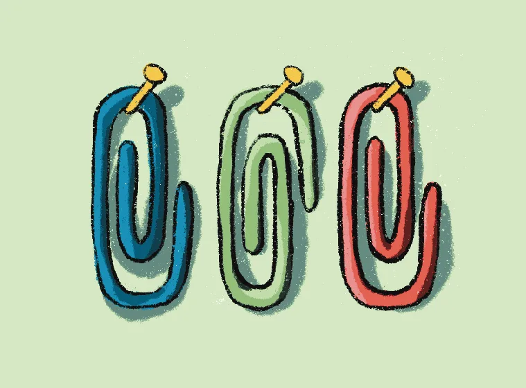 Three paperclips A drawing of three paperclips hanging on nails.