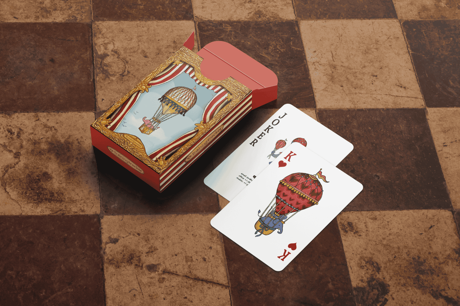 Card box and two cards on a tiled background